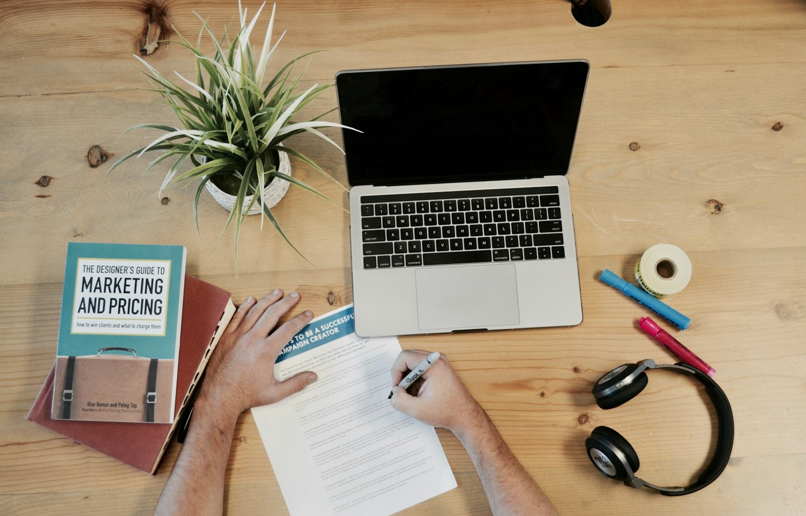 marketing strategy document on desk representing full-funnel stage planning